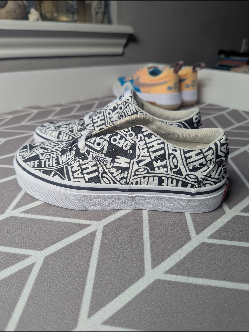 Vans Kids' Black & White Logo Slip-On Sneakers